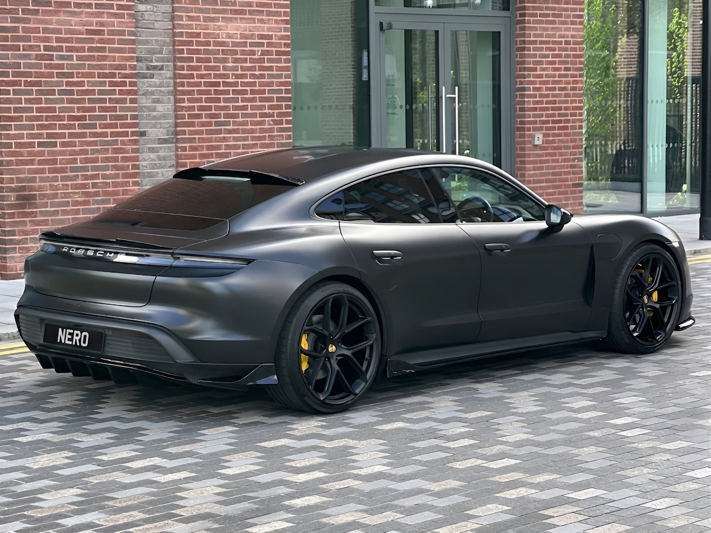 Satin Dark Porsche Taycan Turbo S - Image 1