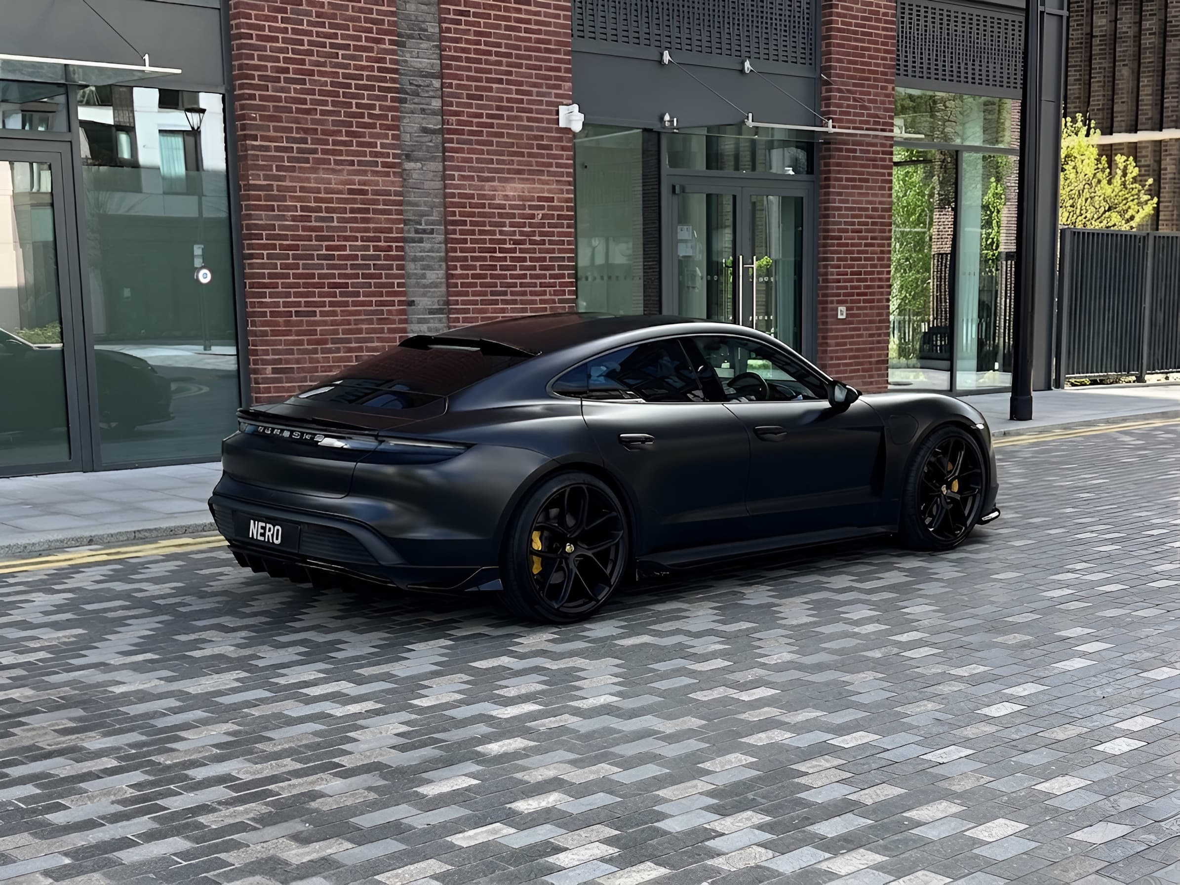 Satin Dark Porsche Taycan Turbo S by NERO